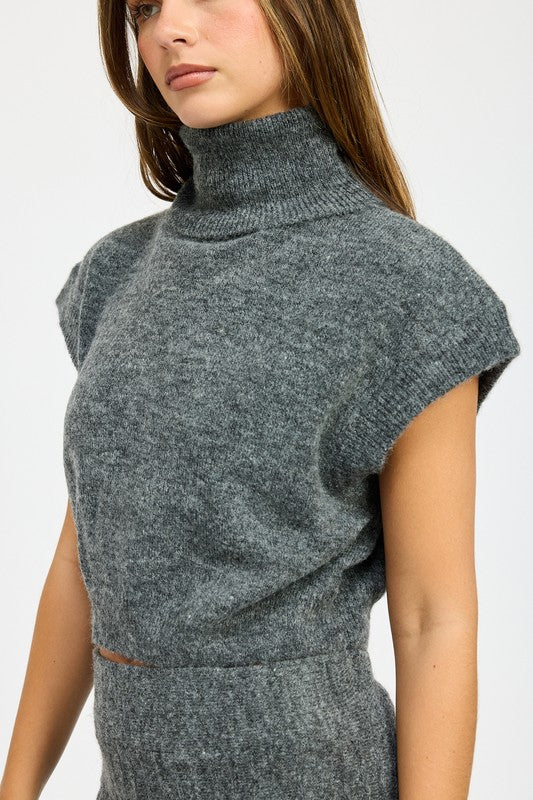 Always On The Go Turtle Neck Cap Sleeve Top