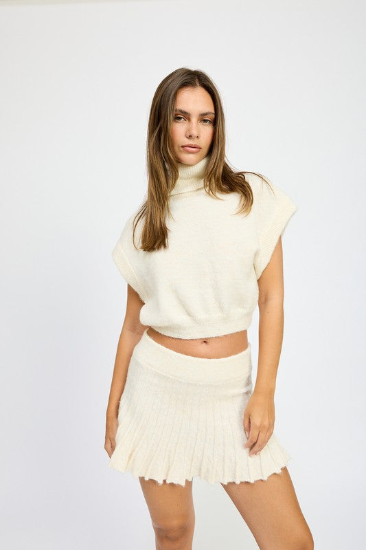 Always On The Go Turtle Neck Cap Sleeve Top